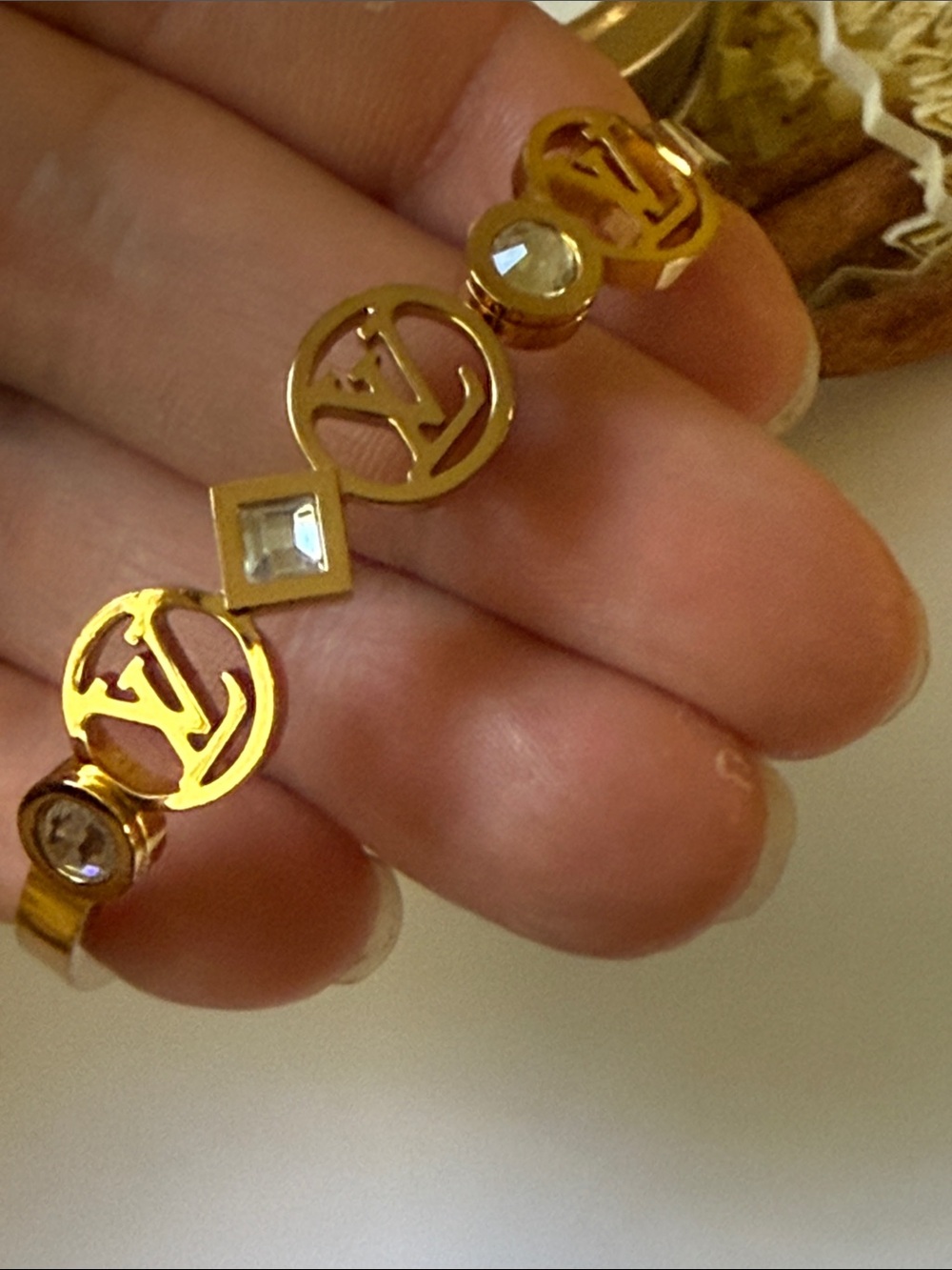 Fashion designer Gold-Tone Logo Crystal Bangle Bracelet - Picture 10 of 10